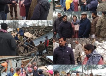 Members of BJP unit Ganderbal visited Rezin Gagangeer, distribute ration and demand grants for the effected families