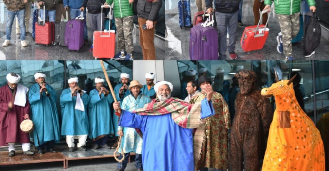 Athletes arrive to a traditional reception at Srinagar Airport