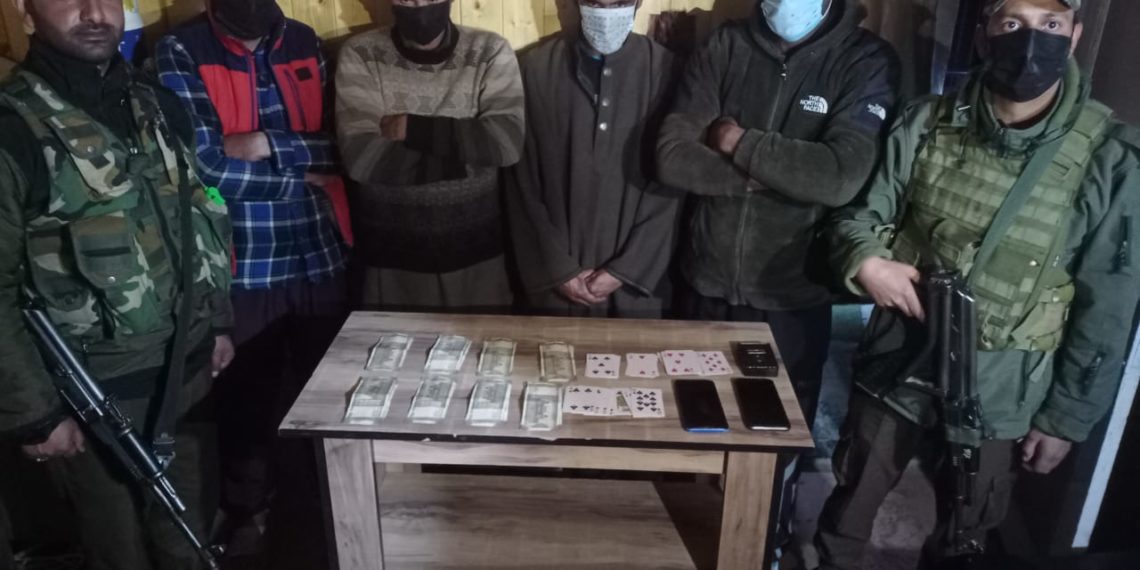 Police arrests five gamblers in Sopore; Stake money, playing cards recovered
