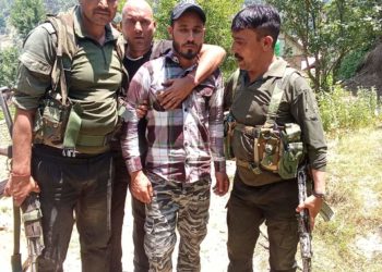 Mohammed Rafi has just been caught alive by the Police Army SOG soldiers from a forest he has been taken into police custody