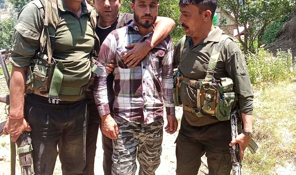 Mohammed Rafi has just been caught alive by the Police Army SOG soldiers from a forest he has been taken into police custody