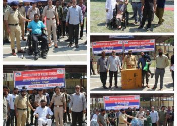 Police distributes wheel chairs among specially-abled persons in Handwara