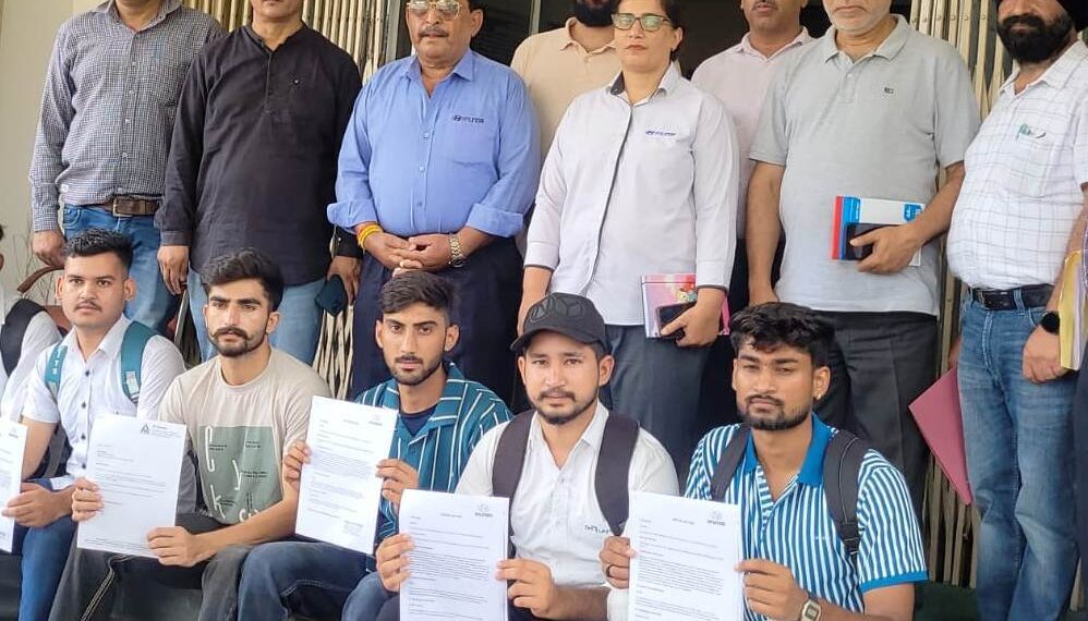 Director SDD hands over offer letters to selected candidates during placement fair