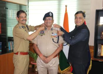 DGP J&K decorates Dr. Sunil Gupta with IGP Rank