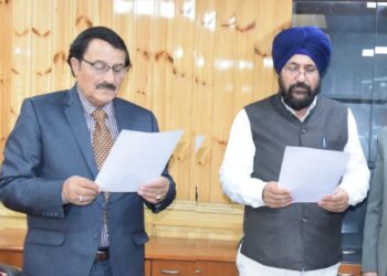 Pro-tem Speaker administers oath to MLA Dr Narinder Singh Raina