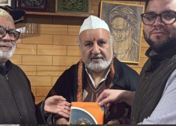 AIKS president Ravinder Pandita felicitated by Aga Sb for inter faith dialogue.