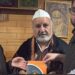 AIKS president Ravinder Pandita felicitated by Aga Sb for inter faith dialogue.