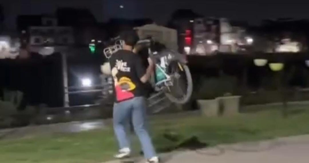 Viral Video Shows Youth Dumping Smart City Cycle into Jhelum, Public Demands Stern Action