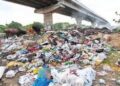 Garbage Dumping Near Shamshipora Bridge Raises Public Health Concerns; Residents Seek Immediate Action