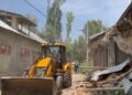 District Administration Budgam, Police Demolish Four Illegal Properties, Including Shops and Tile Factory, Demolished in Budgam Drug Crackdown