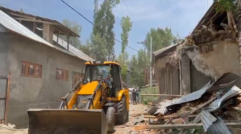 District Administration Budgam, Police Demolish Four Illegal Properties, Including Shops and Tile Factory, Demolished in Budgam Drug Crackdown