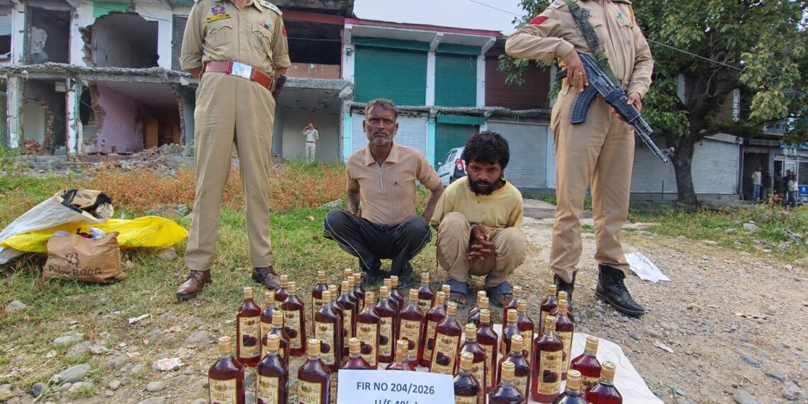 Shopian Police Arrest Two Bootleggers, 43 Bottles ofIllict Liquor Recovered